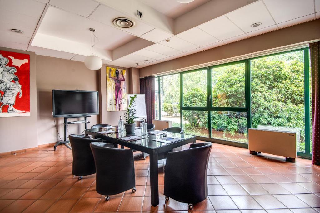 Telewizja i/lub zestaw kina domowego w obiekcie Hotel Della Rotonda