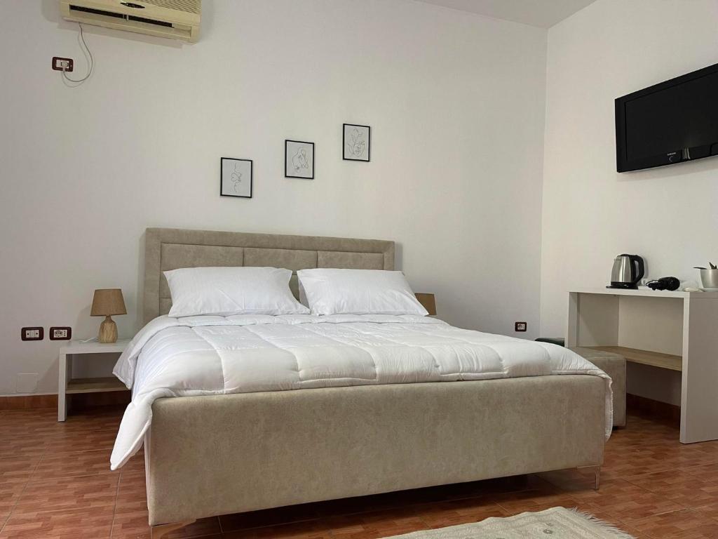 Letto o letti in una camera di Villa Oasis