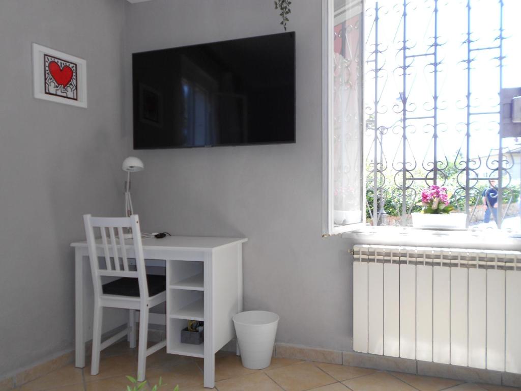 Televízia a/alebo spoločenská miestnosť v ubytovaní Sogno in Cittadella