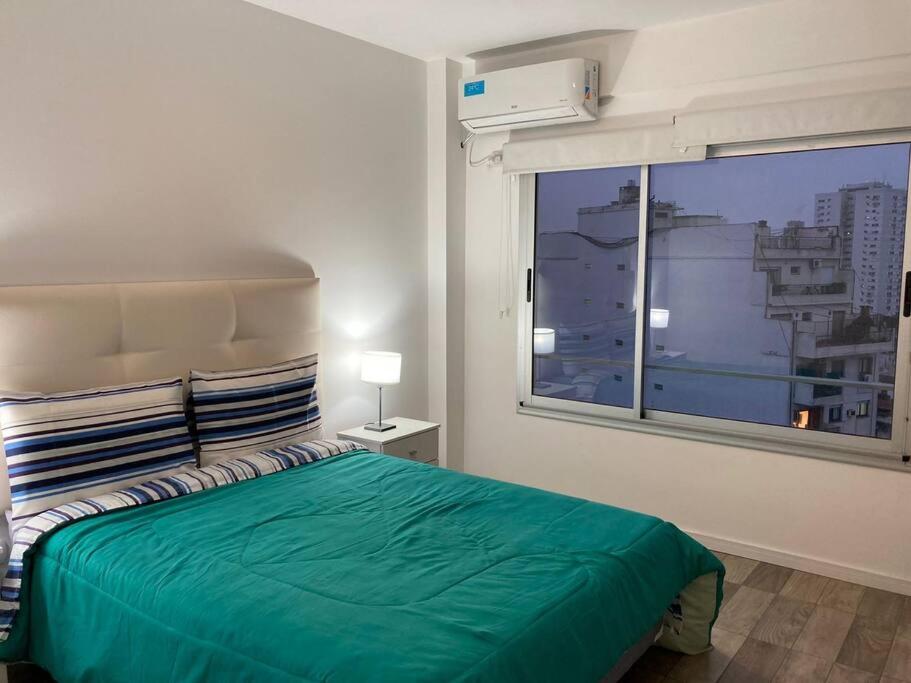 Una cama o camas en una habitación de Moderno y luminoso dpto de 2 ambientes en Palermo