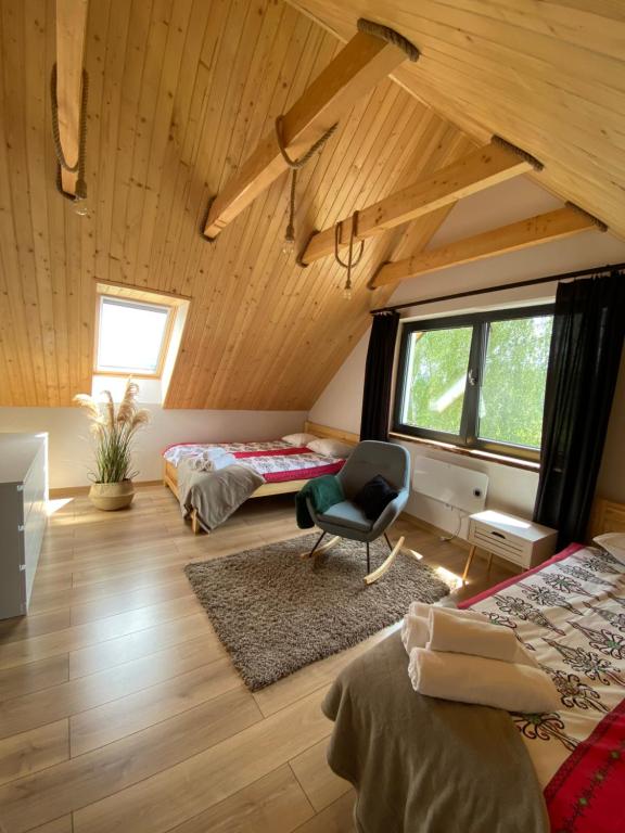 Postel nebo postele na pokoji v ubytování Beskidzki Reset