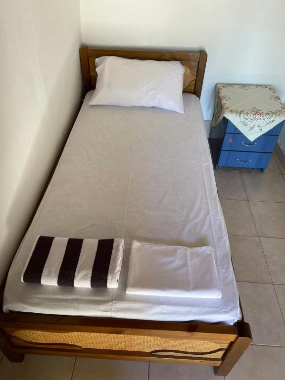Posteľ alebo postele v izbe v ubytovaní Alexiou Guesthouse Pilion Katigiorgis