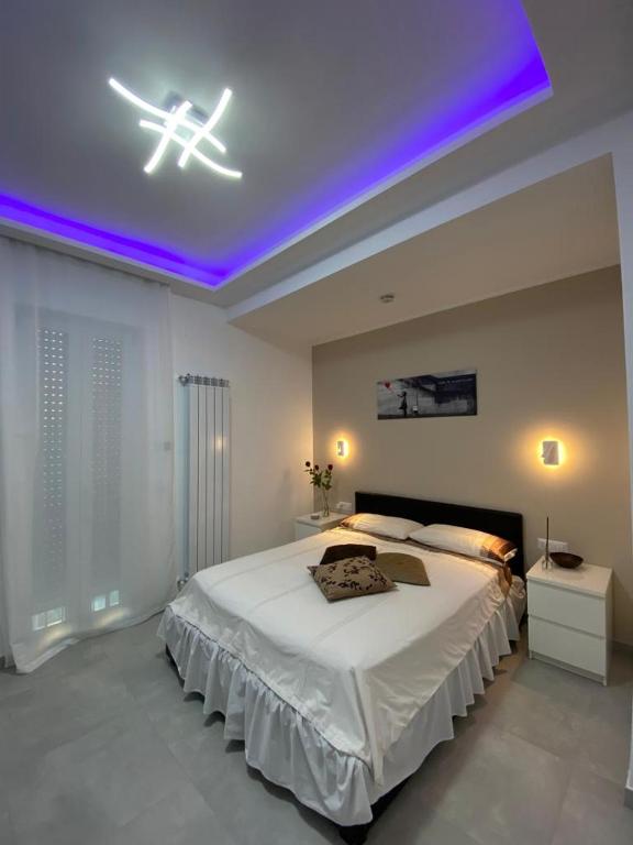 A bed or beds in a room at Mamuccia Rooms