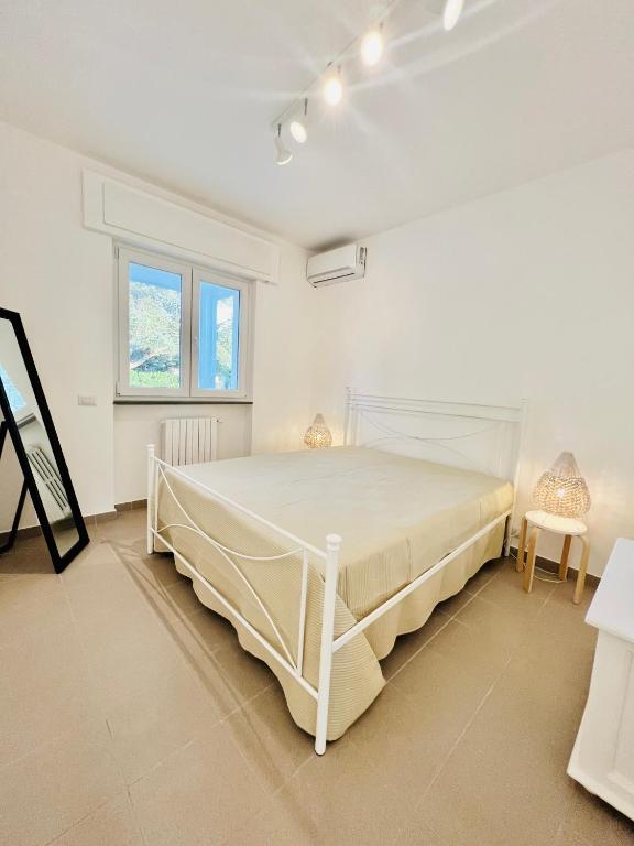 Łóżko lub łóżka w pokoju w obiekcie Villa Bella Luna with Pool - Puglia Mia Apartments