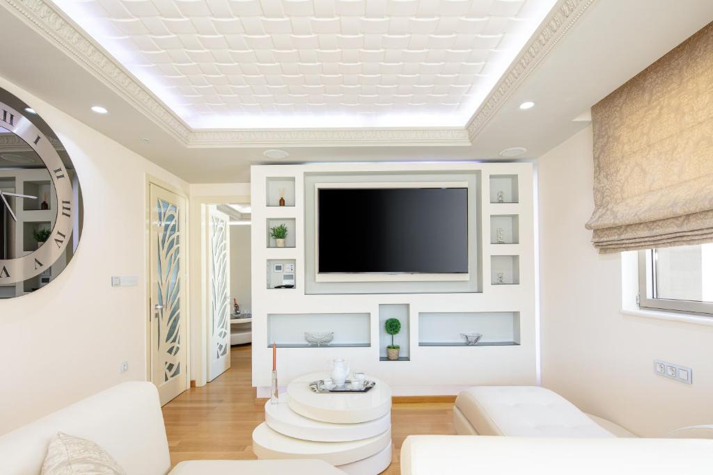 TV a/nebo společenská místnost v ubytování Ma President Suite, DeMaNi President Suites