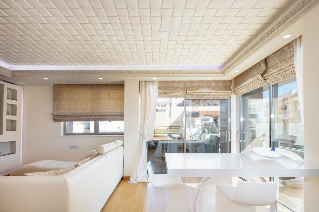 Posezení v ubytování Ma President Suite, DeMaNi President Suites