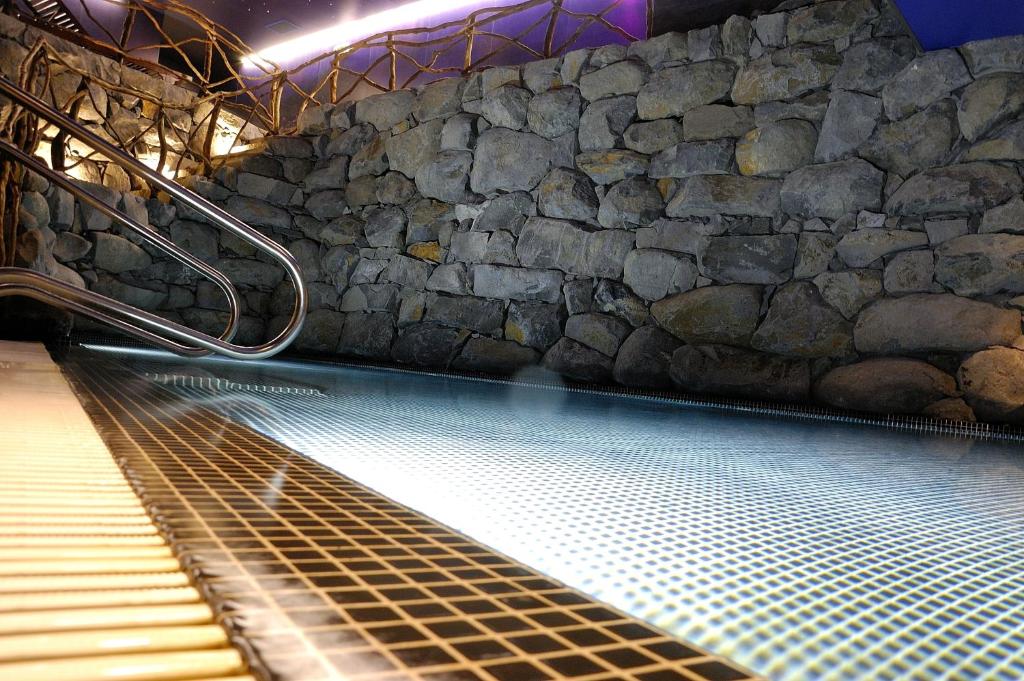 Bazén v ubytování Enotel Lido - All Inclusive nebo v jeho okolí