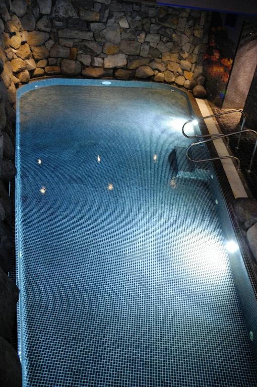 Bazén v ubytování Enotel Lido - All Inclusive nebo v jeho okolí