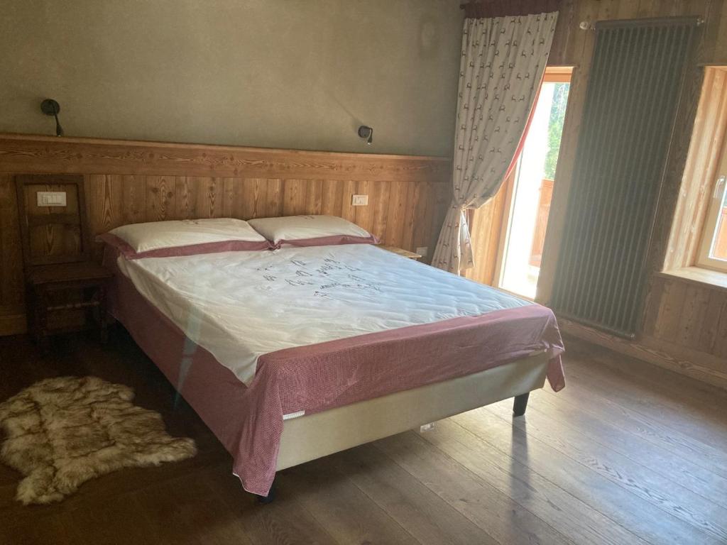 Postel nebo postele na pokoji v ubytování La Noix - Alloggi ad uso turistico - VDA - ARVIER - n 0041 e n 0042