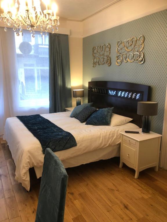 Postel nebo postele na pokoji v ubytování Brighton Surf Guest House