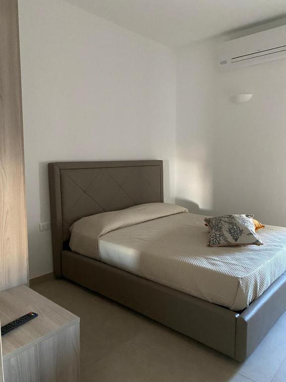 Postel nebo postele na pokoji v ubytování ViaMazzini24-Suite