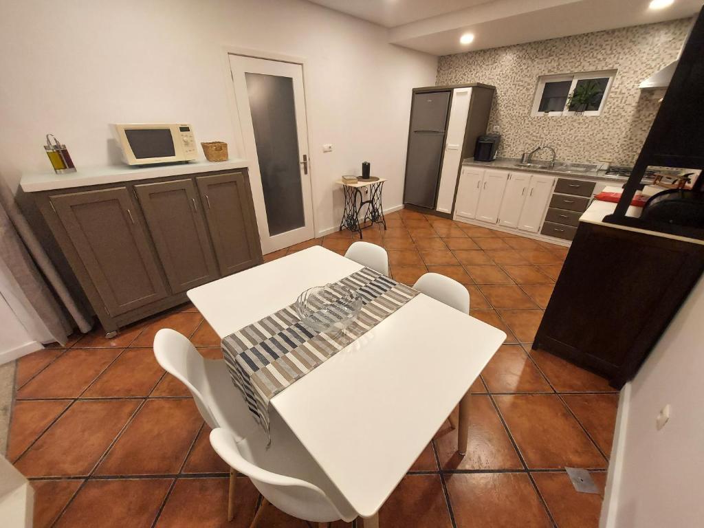 Kuchyň nebo kuchyňský kout v ubytování Villa Casa de Santo Antonio
