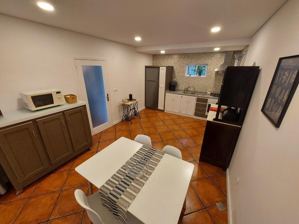 Kuchyň nebo kuchyňský kout v ubytování Villa Casa de Santo Antonio