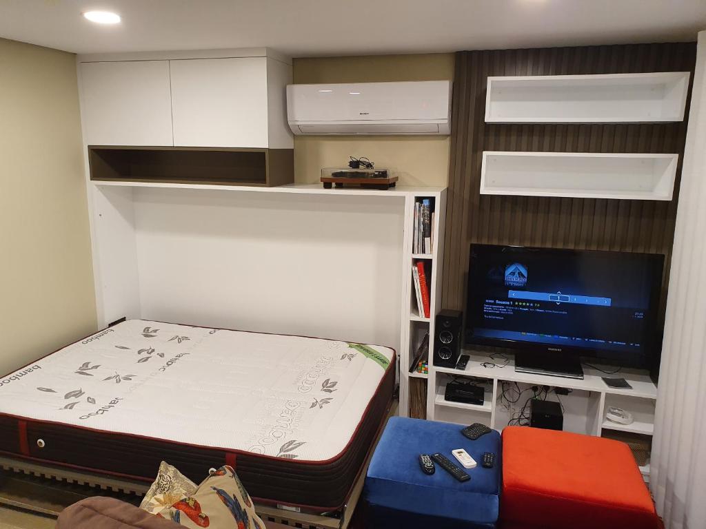 TV a/nebo společenská místnost v ubytování Villa Casa de Santo Antonio
