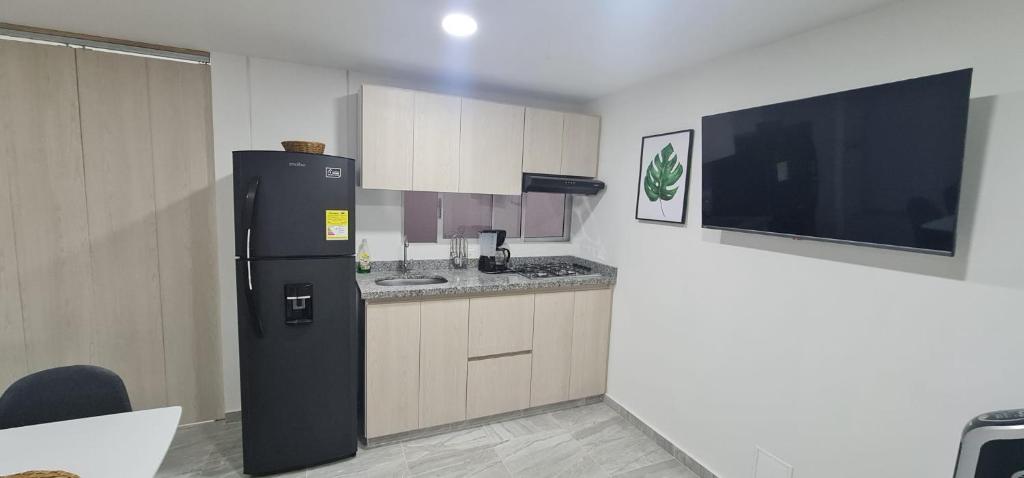 Kuchyň nebo kuchyňský kout v ubytování Hermoso Apartamento Entero - Parqueadero - Ibague - Roble