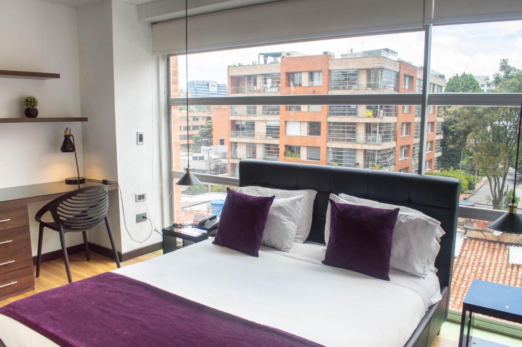 Postel nebo postele na pokoji v ubytování Suites Casa 95