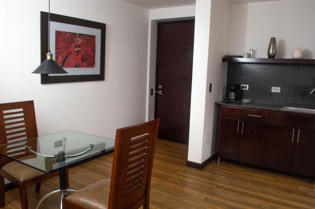 Kuchyň nebo kuchyňský kout v ubytování Suites Casa 95