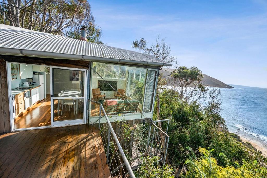 a house with a view of the ocean at Hideaway At Wye in Wye River
