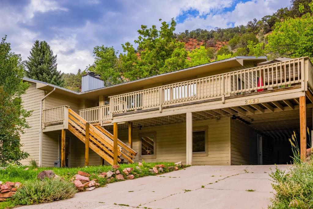 a house with a deck on the side of it at Palmer House in Glenwood Springs