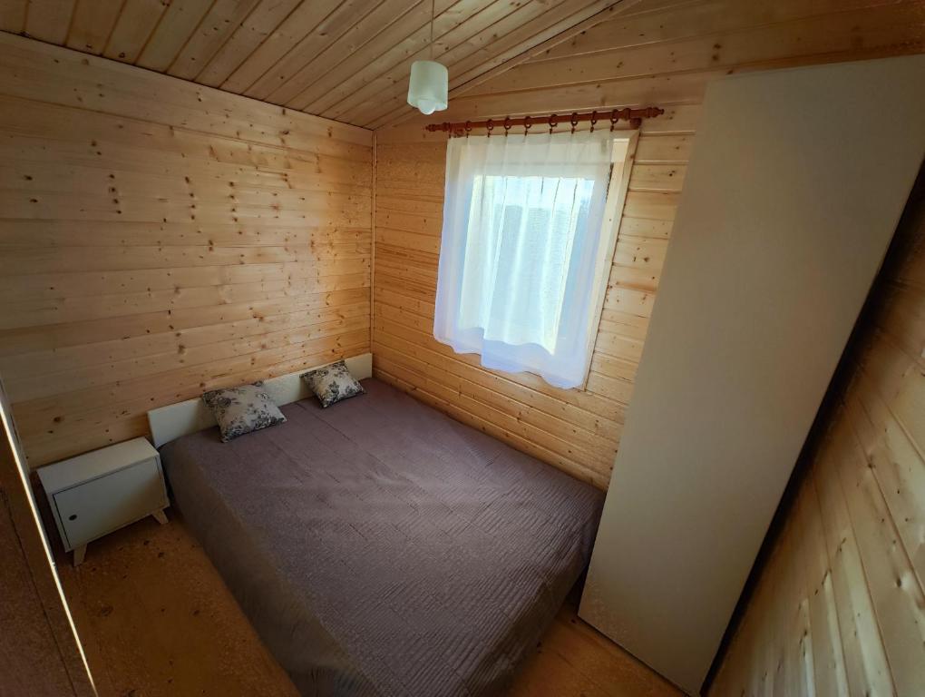 Fotografia z galérie ubytovania Casa Del Żywki - Domki Letniskowe v destinácii Żywki