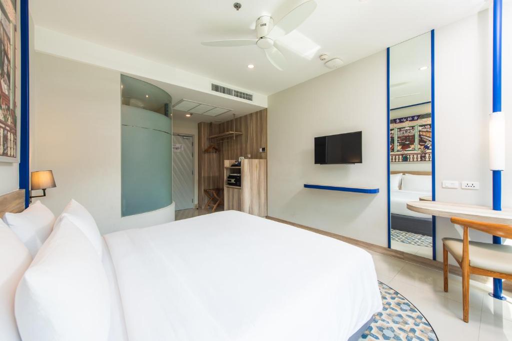 Cama ou camas em um quarto em Holiday Style Ao Nang Beach Resort, Krabi