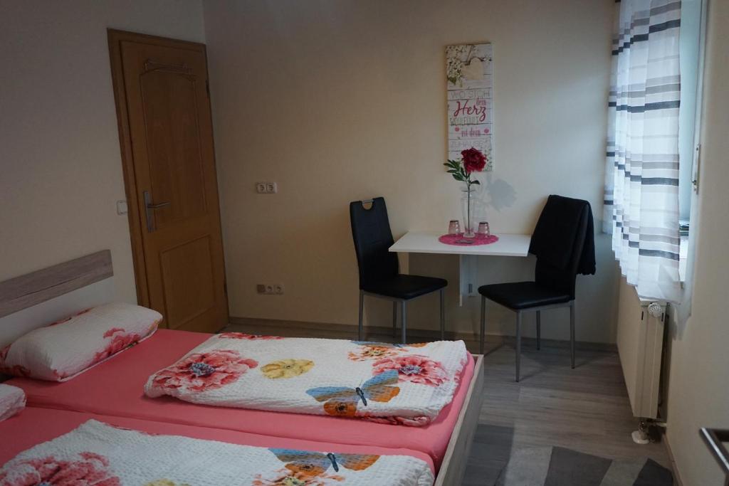 Postel nebo postele na pokoji v ubytování Gegg`s Fe-Wo oder Doppelzimmer