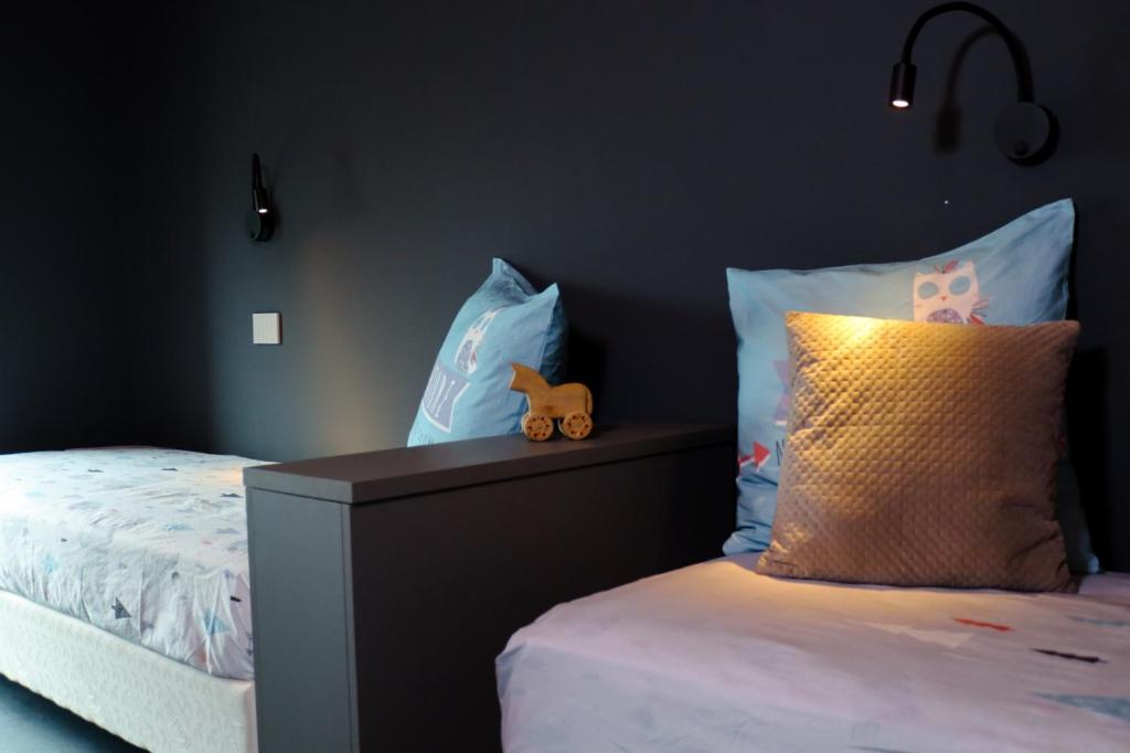 Letto o letti in una camera di Le Volpi Luxury Apartments