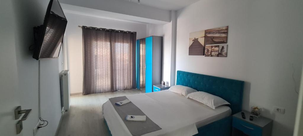 Giường trong phòng chung tại Mamaia Nord