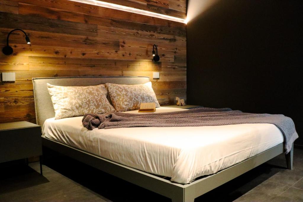Letto o letti in una camera di Le Volpi Luxury Apartments