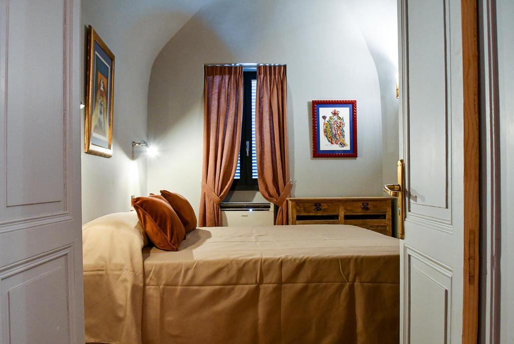 Postel nebo postele na pokoji v ubytování Agriturismo Peq Agri-Resort Tovo