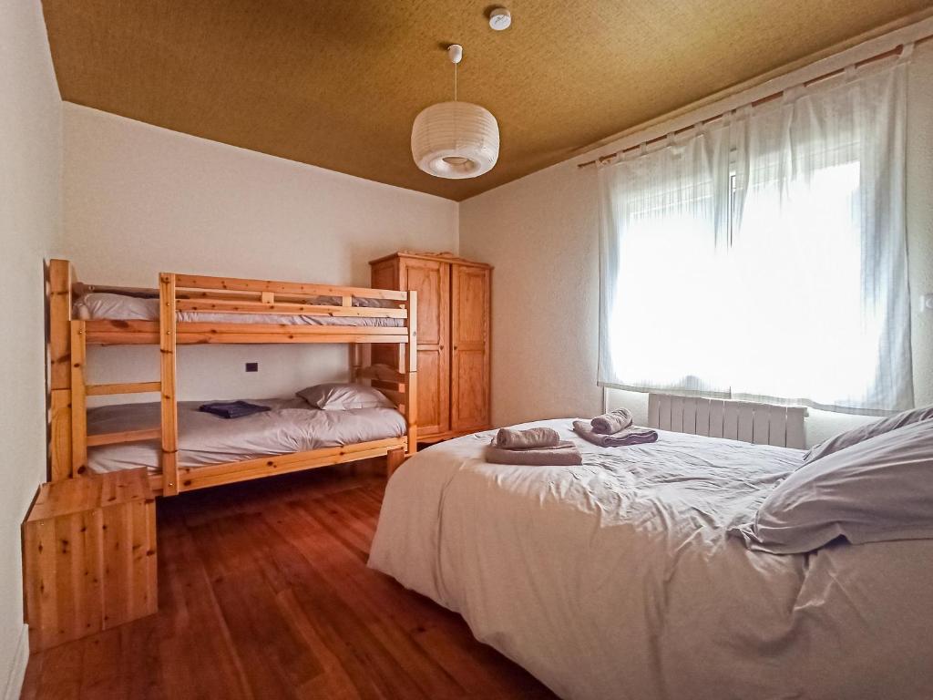 Dviaukštė lova arba lovos apgyvendinimo įstaigoje Gite 6 personnes avec terrasse