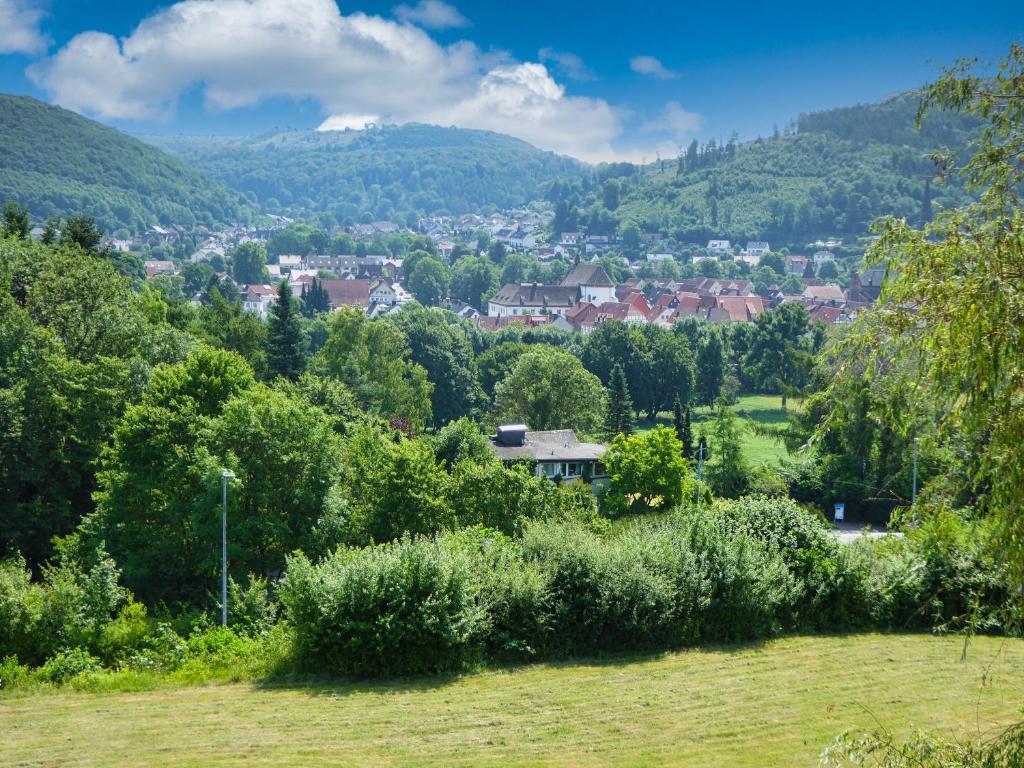 a view of a town in a valley with mountains at Sonnenhof in Lügde