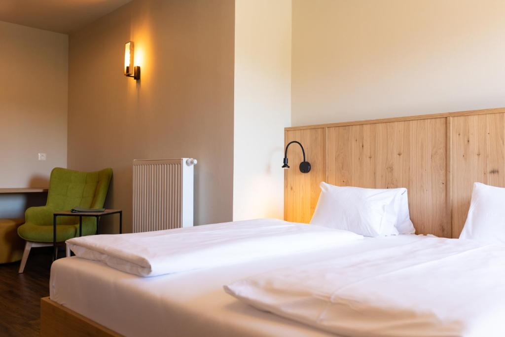 Letto o letti in una camera di Finkensteiner Hof