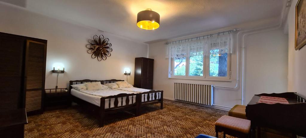 Posteľ alebo postele v izbe v ubytovaní RelaxSpace Vendégház