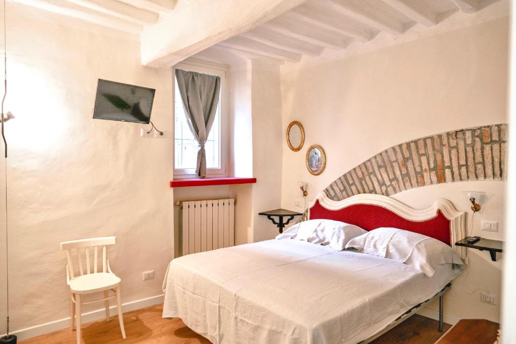 Posteľ alebo postele v izbe v ubytovaní Piccolo girasole