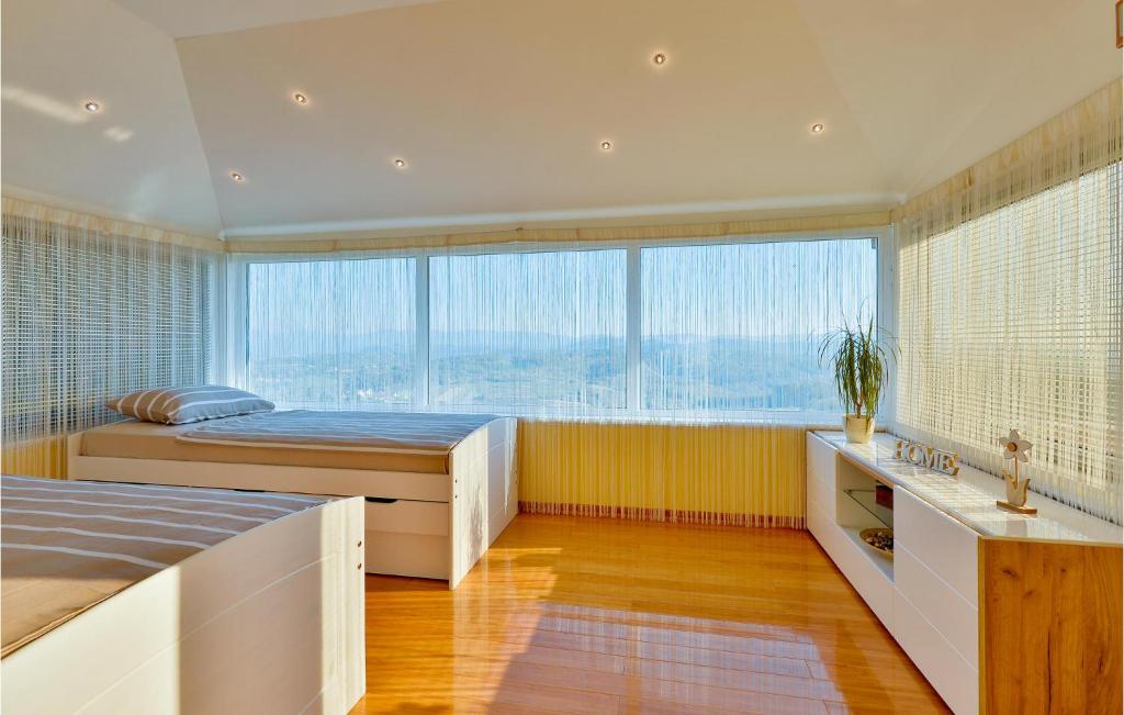 Posteľ alebo postele v izbe v ubytovaní Cozy Home In Novi Marof With Sauna