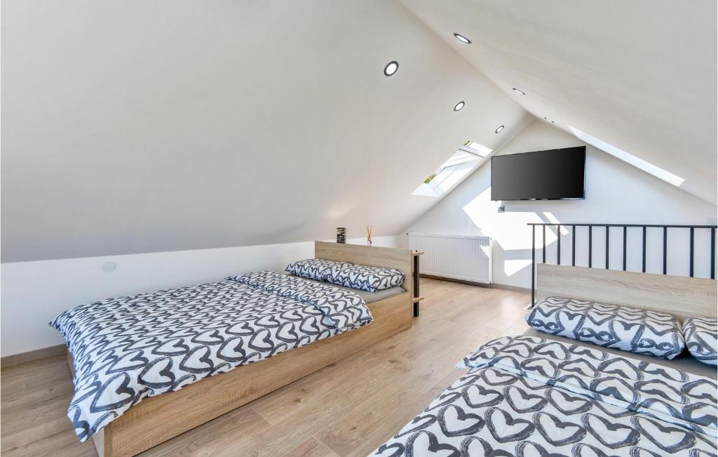 Posteľ alebo postele v izbe v ubytovaní Cozy Home In Novi Marof With Sauna