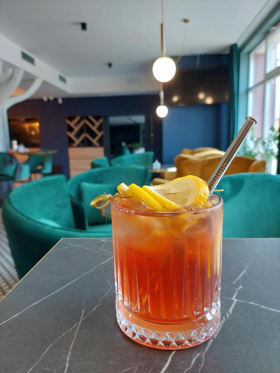 Nápoje v ubytovaní Hotel Alfa