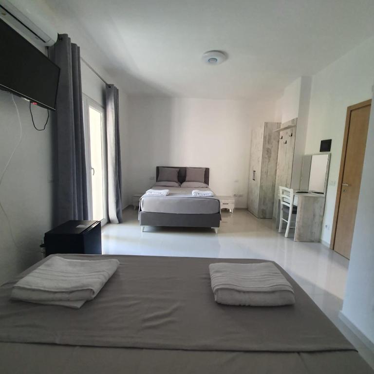 Postel nebo postele na pokoji v ubytování Hotel 33