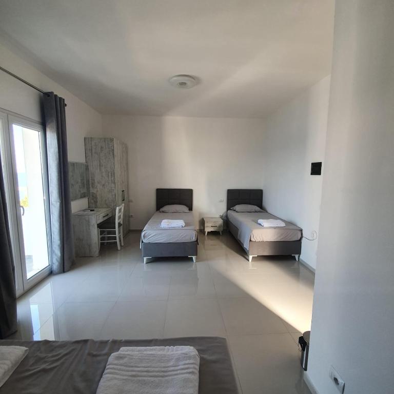 Postel nebo postele na pokoji v ubytování Hotel 33