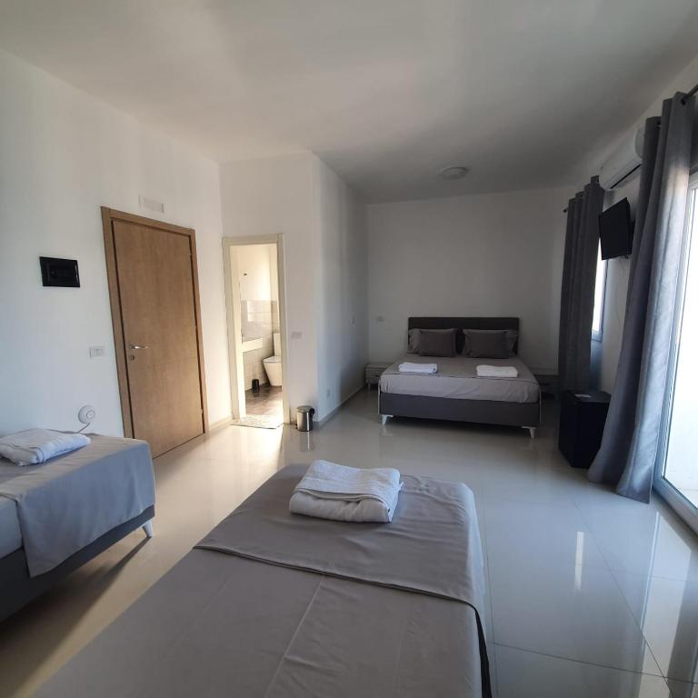 Postel nebo postele na pokoji v ubytování Hotel 33