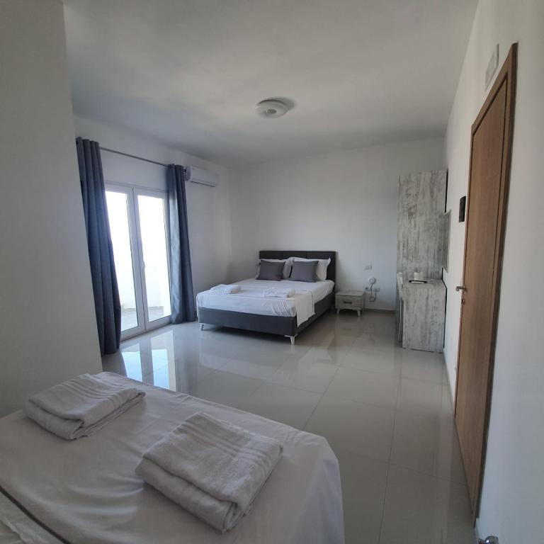 Postel nebo postele na pokoji v ubytování Hotel 33
