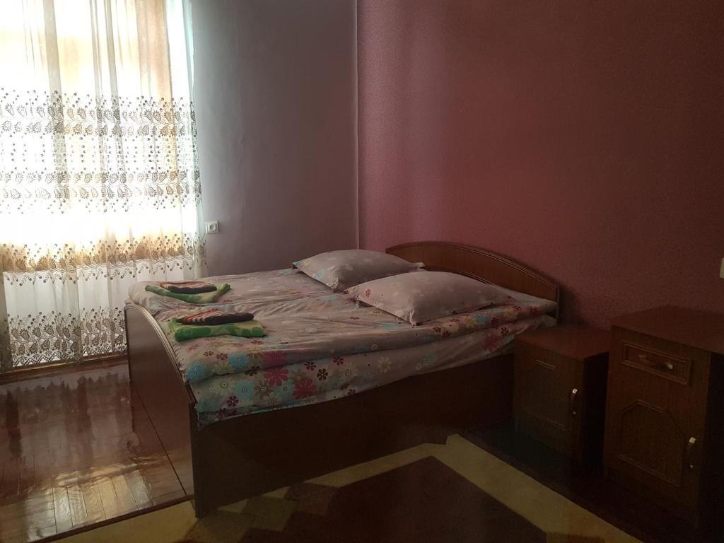 Postel nebo postele na pokoji v ubytování Guest House Adigeni