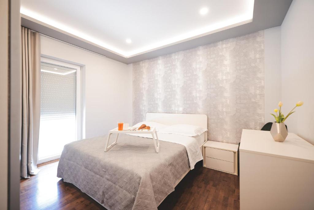 Posteľ alebo postele v izbe v ubytovaní Villa Todi