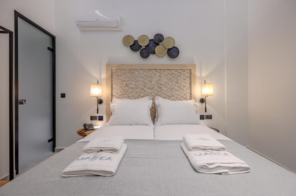 Posteľ alebo postele v izbe v ubytovaní Marea Boutique Suites