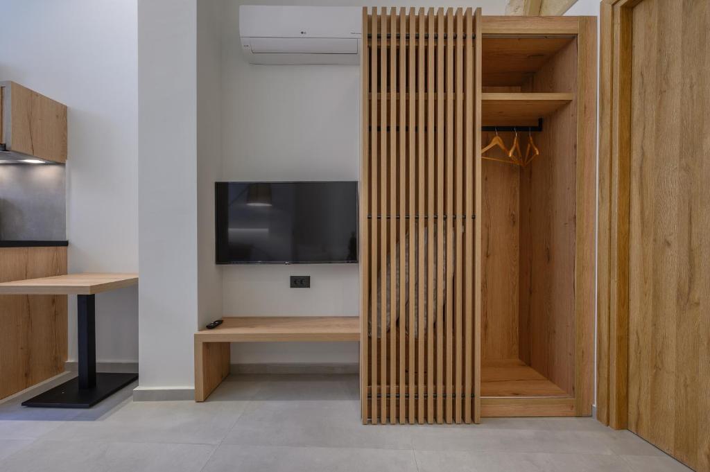 Televízia a/alebo spoločenská miestnosť v ubytovaní Marea Boutique Suites