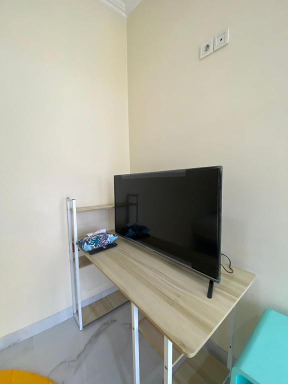TV a/nebo společenská místnost v ubytování PALAGAN HUIS