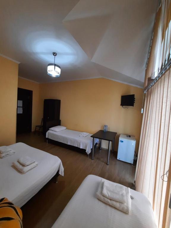 Postel nebo postele na pokoji v ubytování Delta Hotel