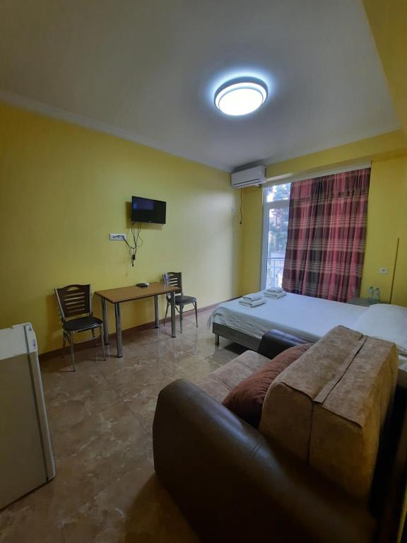 TV a/nebo společenská místnost v ubytování Delta Hotel