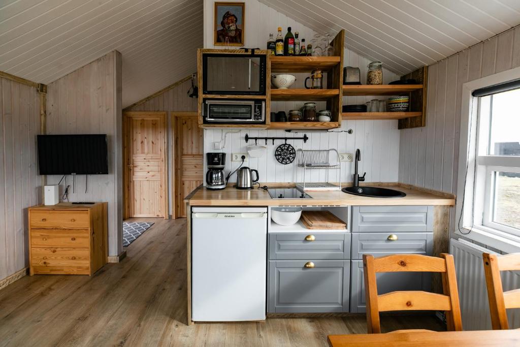 Kuchyň nebo kuchyňský kout v ubytování Ocean Break Cabins